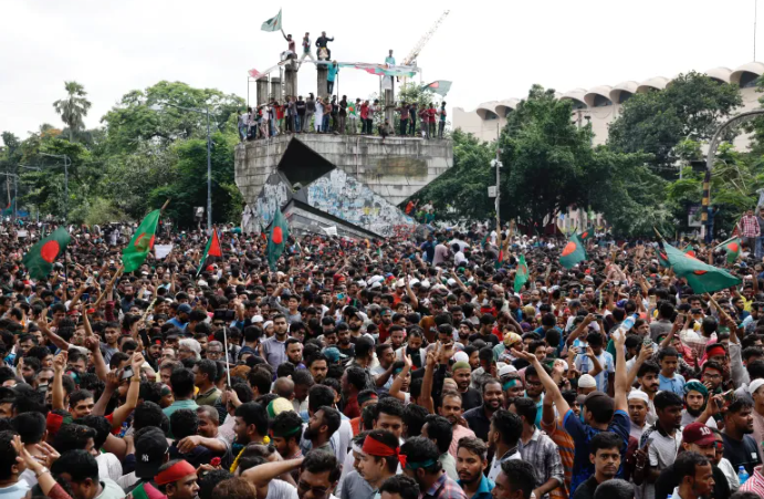 People celebrate the resignation of Bangladeshi Prime Minister Sheikh Hasina in Dhaka, Bangladesh