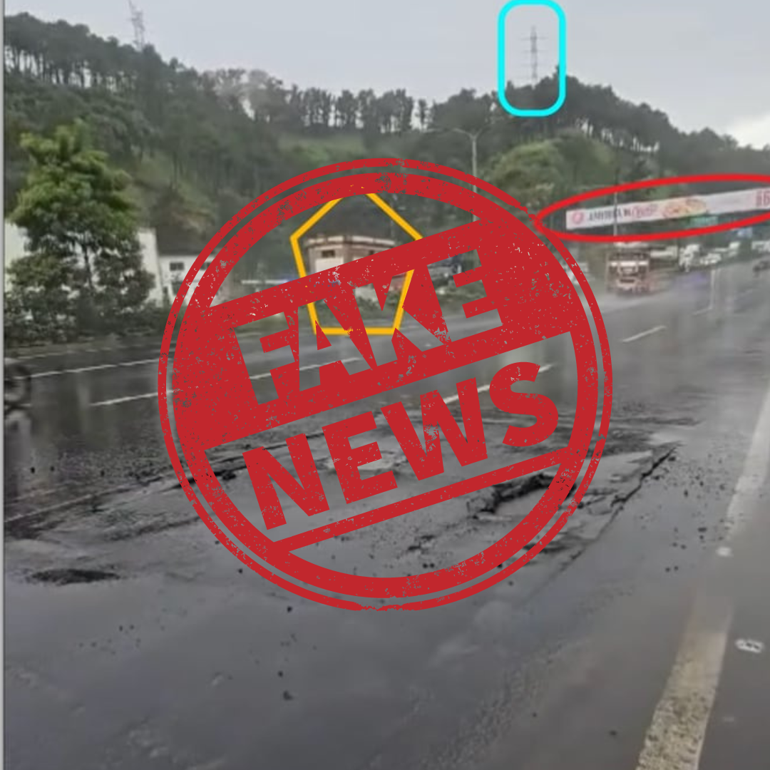 Water jets spray out of Guatemalan road.